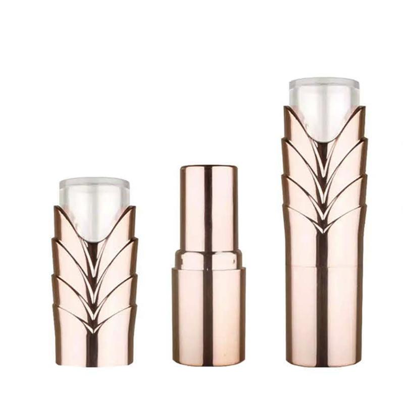 SPG-SYX1104 – a rose gold lipstick tube with embossed leaf pattern and clear dome cap. Designed for premium beauty lines with customization options.